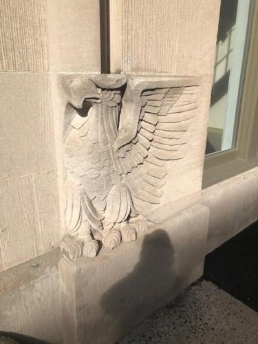 front corner of building showing stone